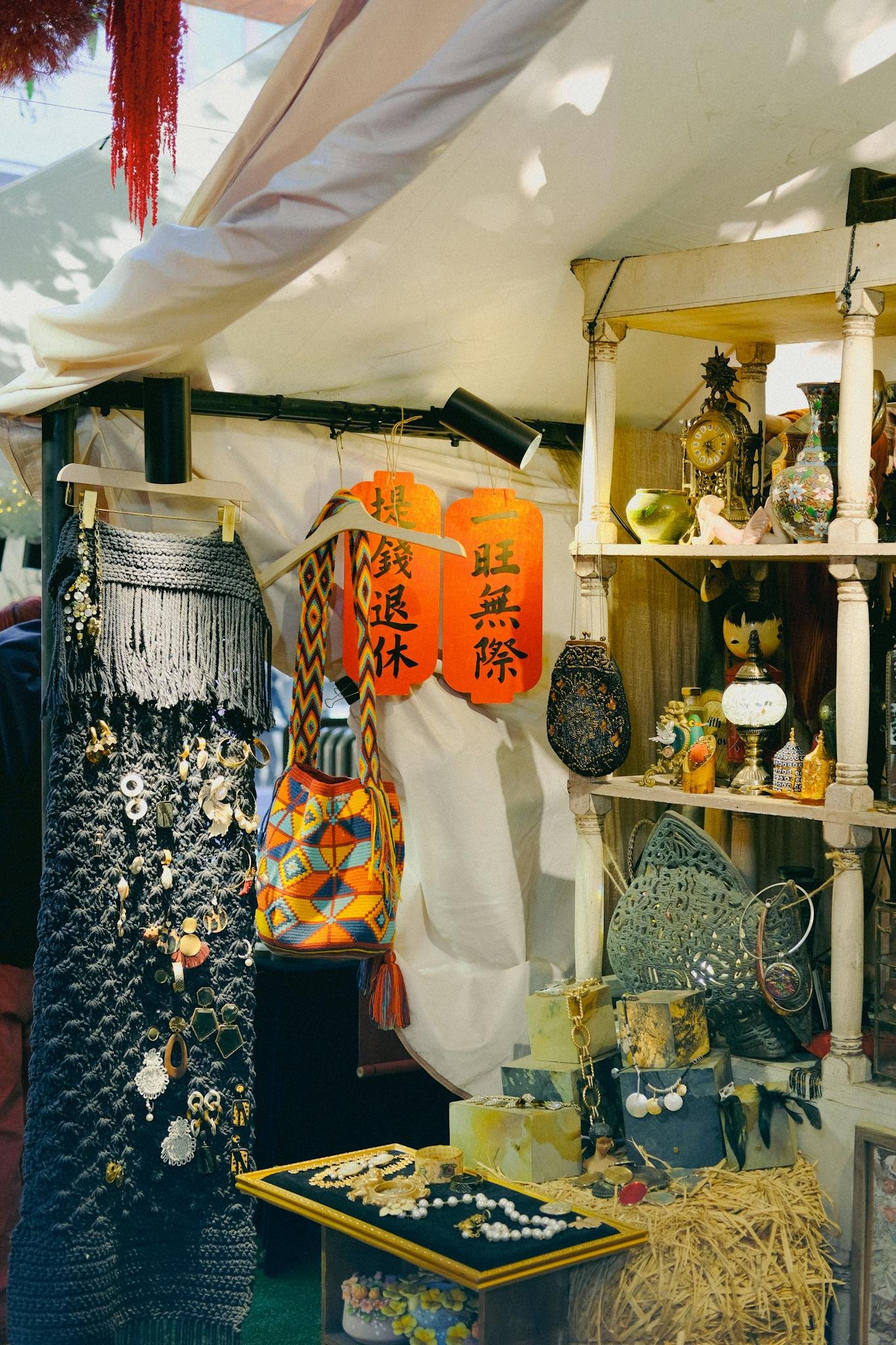 A lively market stall showcasing colorful crafts and traditional decor, perfect for cultural explorations.
