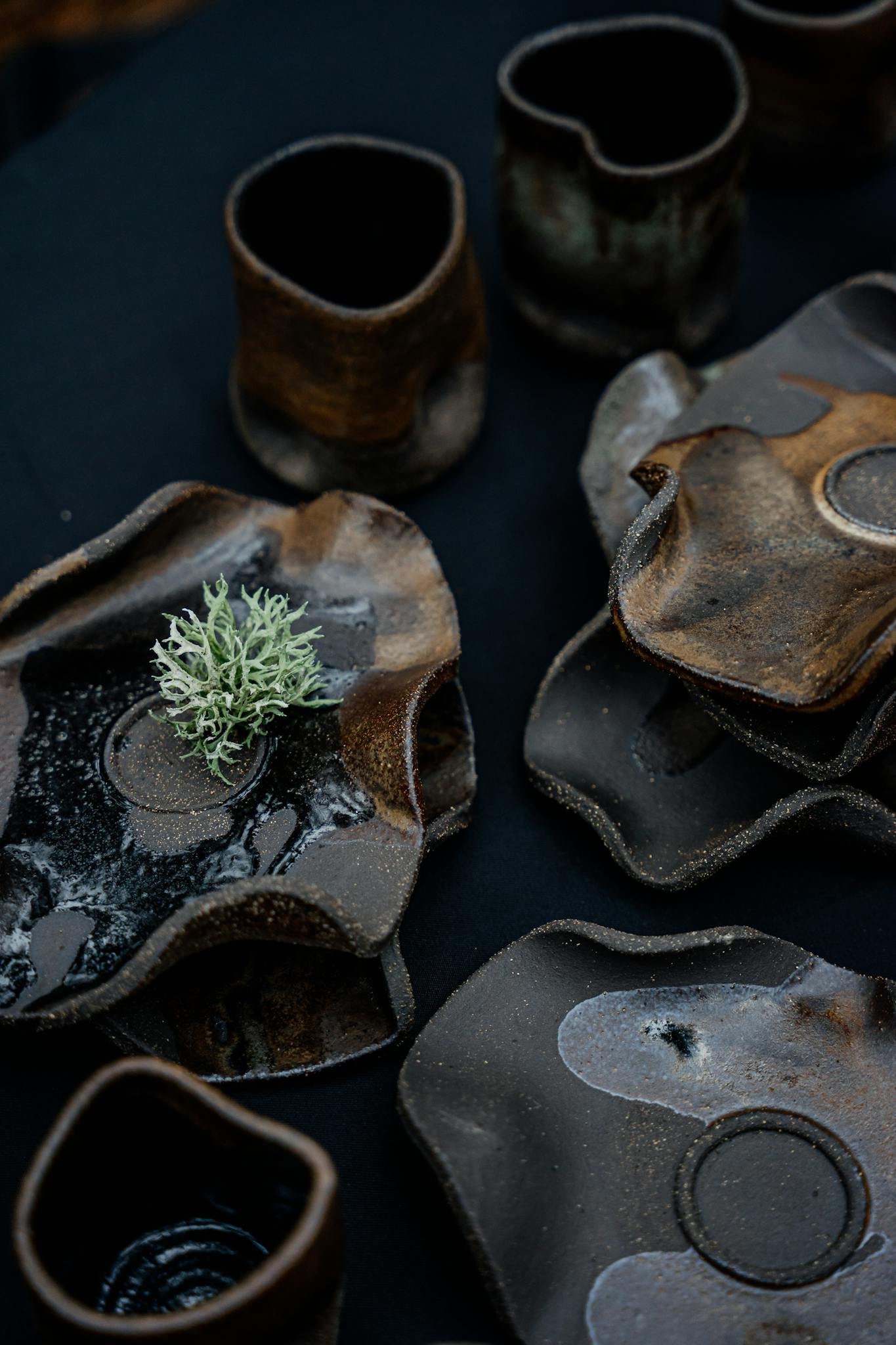 Artistic handmade pottery with rustic textures, perfect for unique decor.